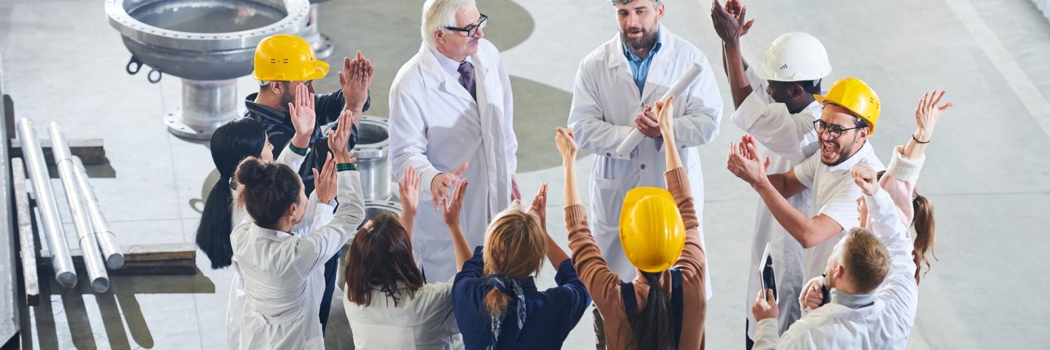 Group of Happy Factory Workers